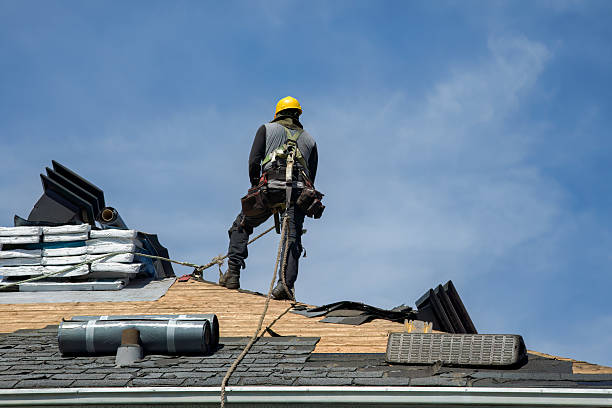 Professional Roof Replacement technician working in Commerce Township, MI